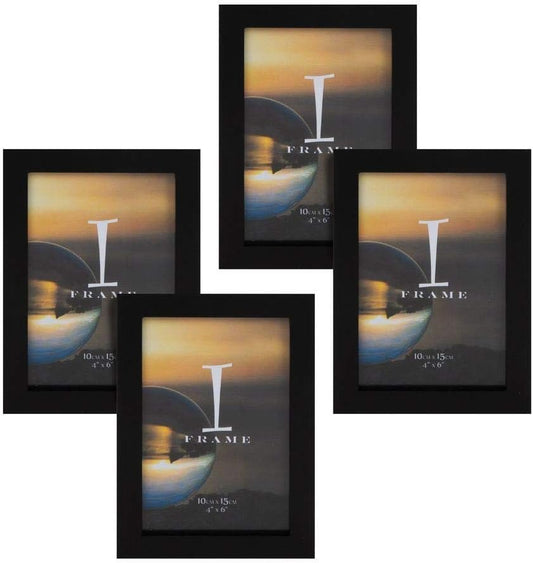 Set of four black picture frames with a sunset design on a white background