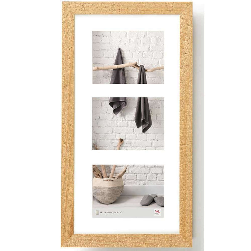 Wooden picture frame with a photo of a bathroom scene inside