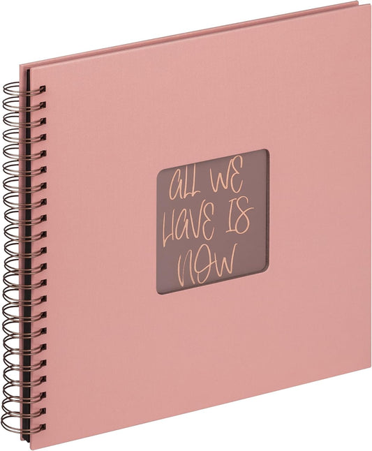 Pink album with a motivational quote on a white background