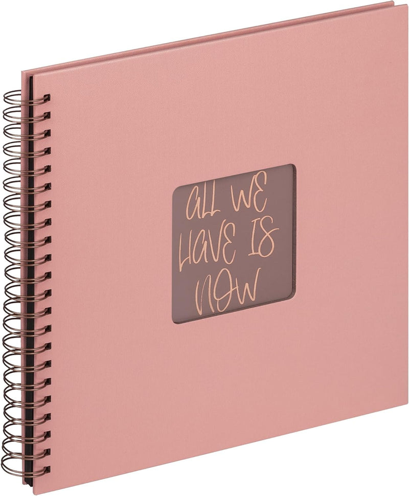 Pink album with a motivational quote on a white background