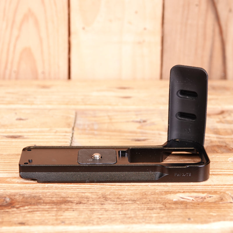 Used Neewer camera hand grip designed for camera models like the Fujifilm X-T5