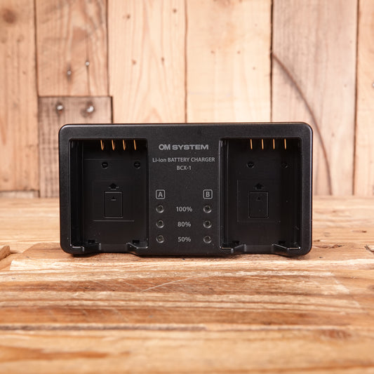 Used OM System BCX-1 Battery Charger