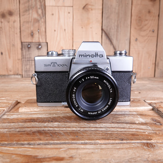 Used Minolta SRT 100x 35mm SLR Camera with 50mm F2 MC Rokkor-PF Lens