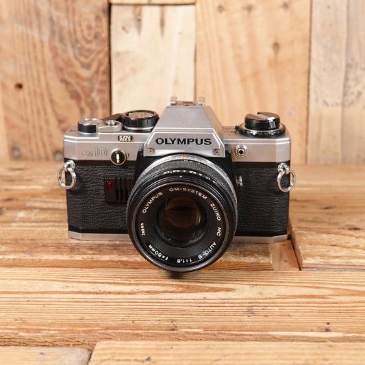 Used Olympus OM-10 Silver 35mm Film Camera Body with Zuiko 50mm F1.8 Lens