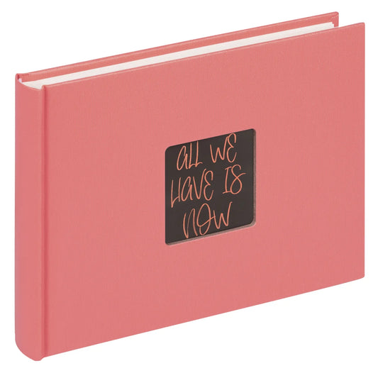 Pink book with a black label on a white background